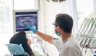 Dentist explaining xrays